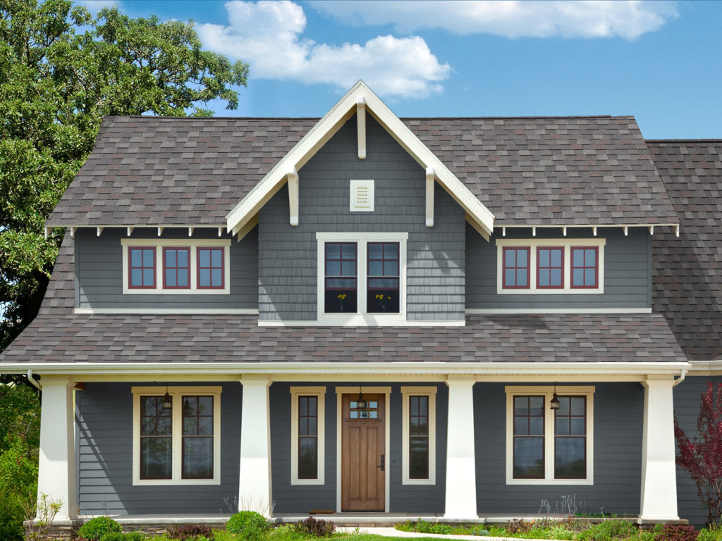 Home Improvement Royal - Two-story craftsman-style home with GAF shingles, ProVia entry door, and dark gray siding, by WinTek USA