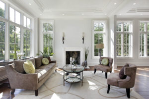 Living room in luxury home with fireplace.