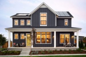 exterior of two-story home with new windows and doors