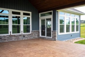 large winds with white frames set in an attractive home