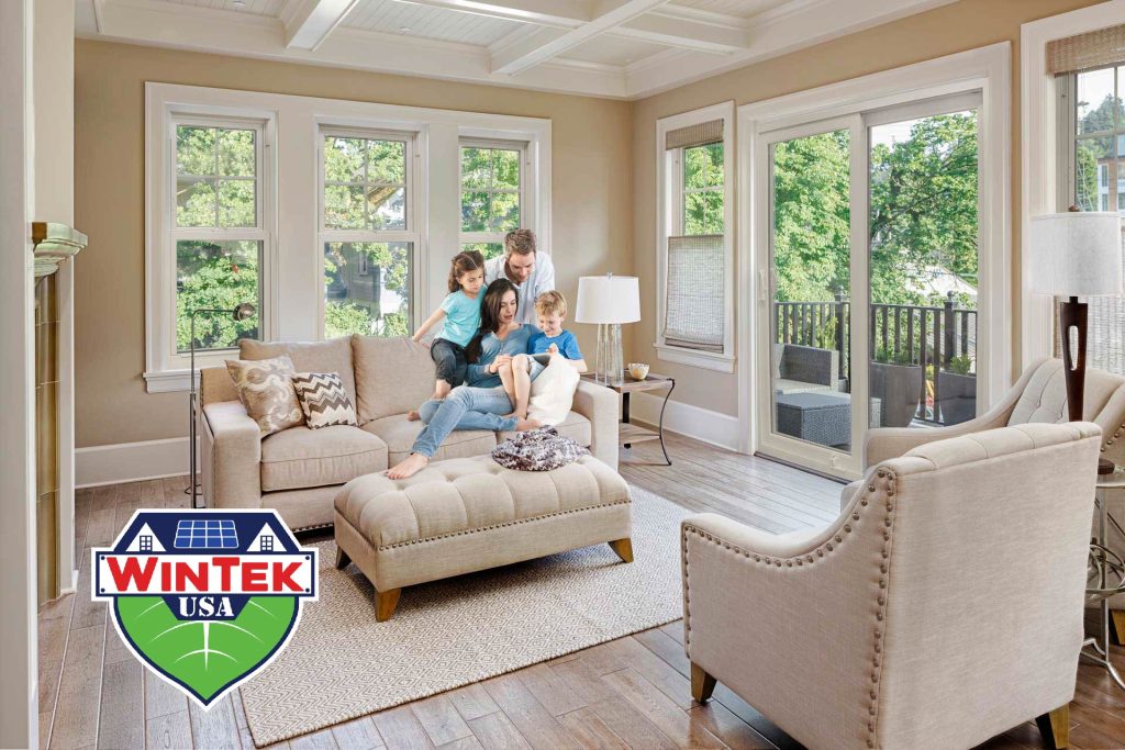 Family enjoying energy-efficient EcoTek windows in their living room in Shreveport, LA, installed by WinTek USA.